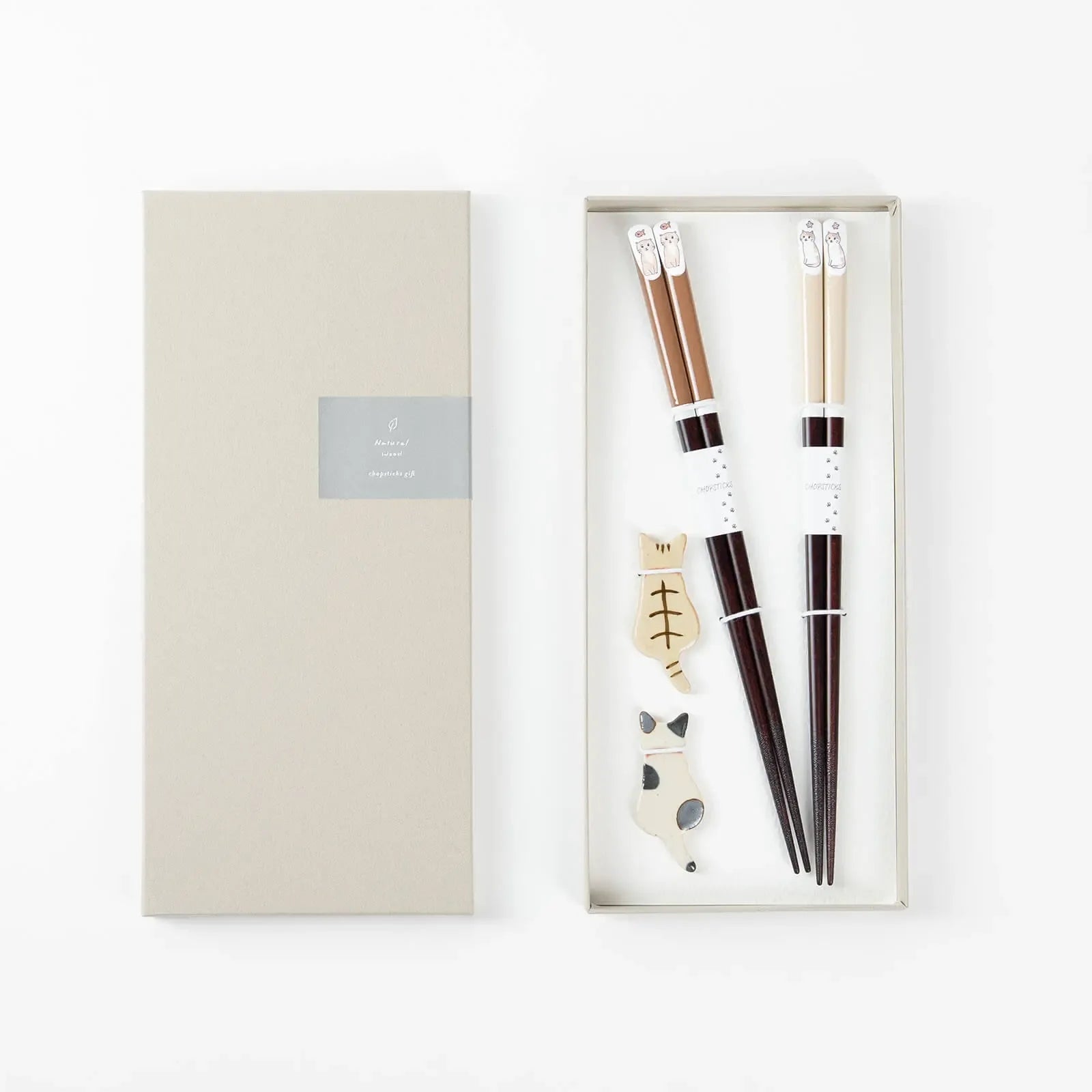 Cat couple chopsticks gift set in brown and beige, 23cm, with matching ceramic chopstick rests.