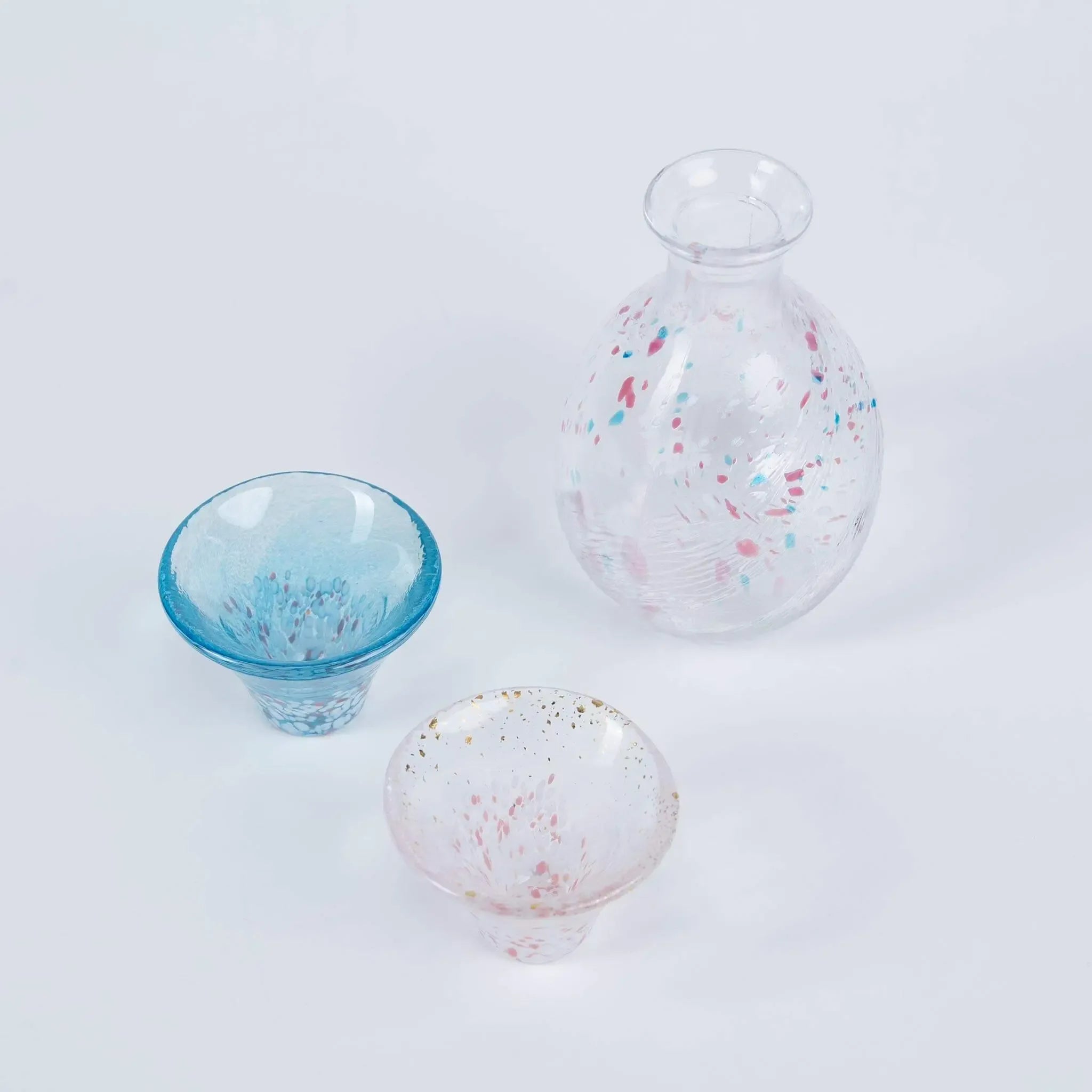 Handmade Japanese sake set featuring sakura and Mount Fuji motif, glass cups and sake bottle made in Japan.