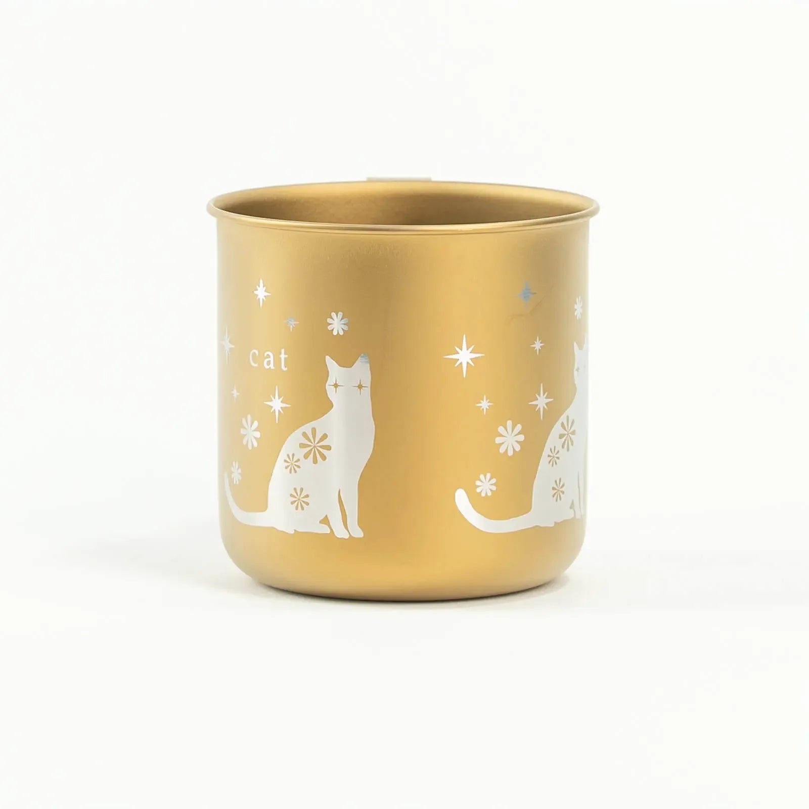 Side view of HORIE titanium cat mug in gold