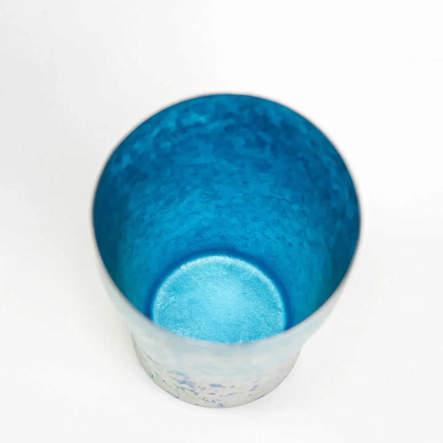 Interior of blue titanium tumbler, clean finish