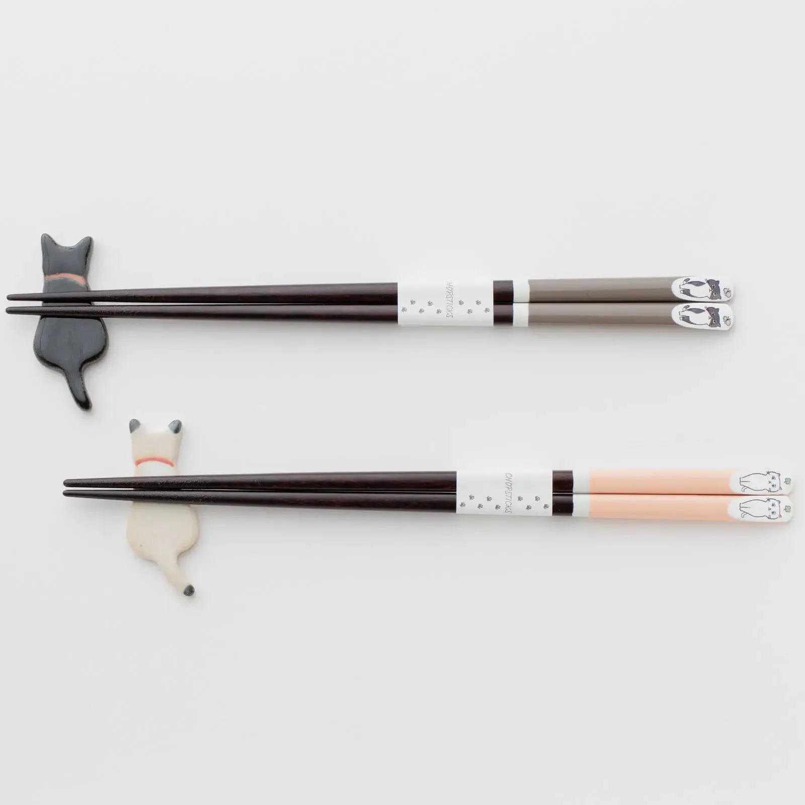 ray and pink cat-themed chopsticks, 23cm, displayed on ceramic cat chopstick rests.