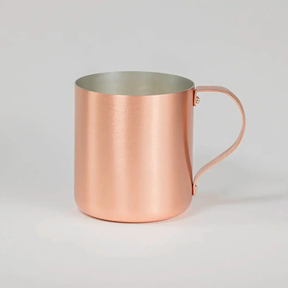 Detailed close-up of the copper matte mug, featuring its aged copper appearance.