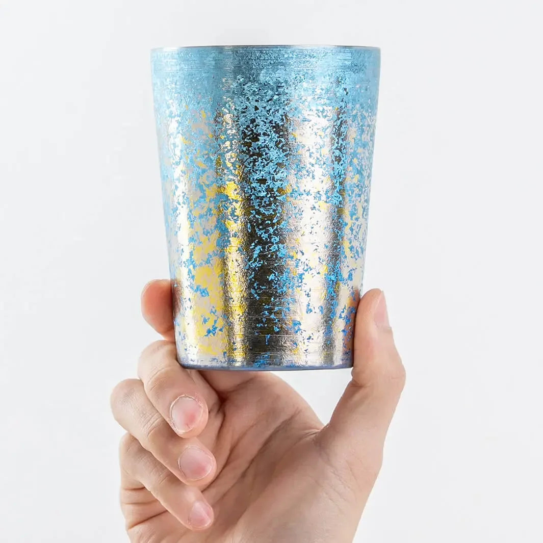 Blue titanium tumbler hand-held from front, 400ml