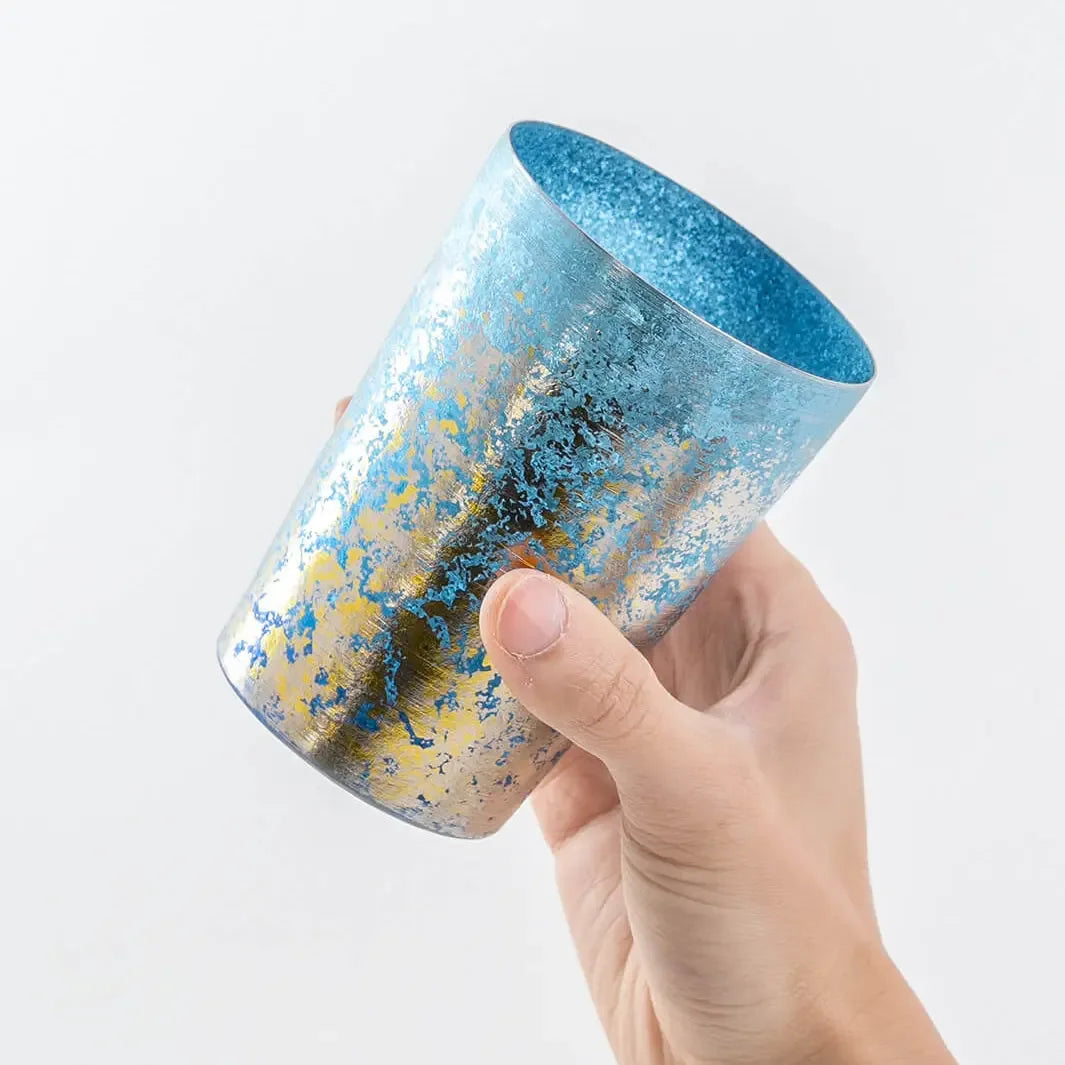 Blue HORIE tumbler held from side, textured finish