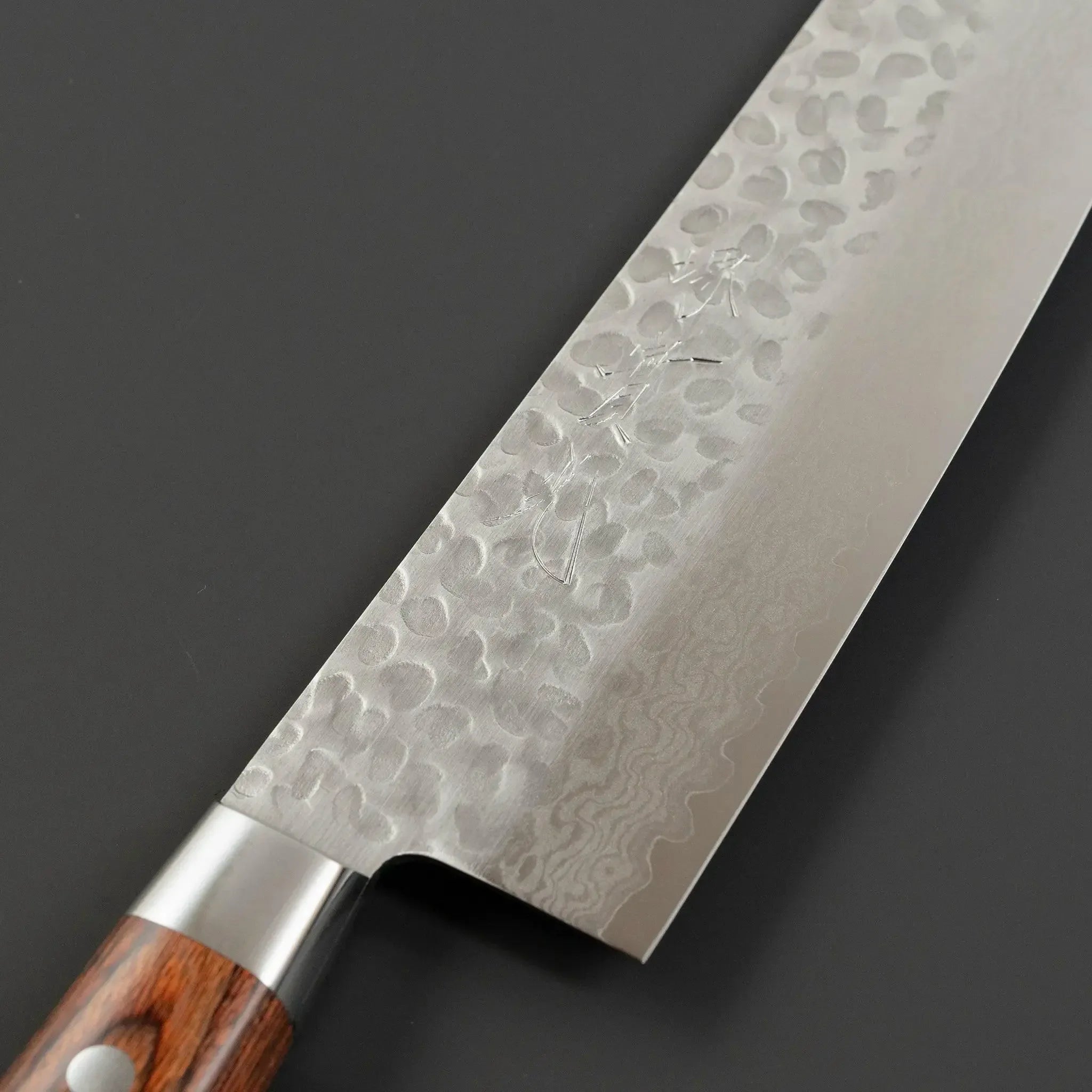 Jikko Damascus VG10 Stain Resistant Steel Gyuto Knife Blade Logo