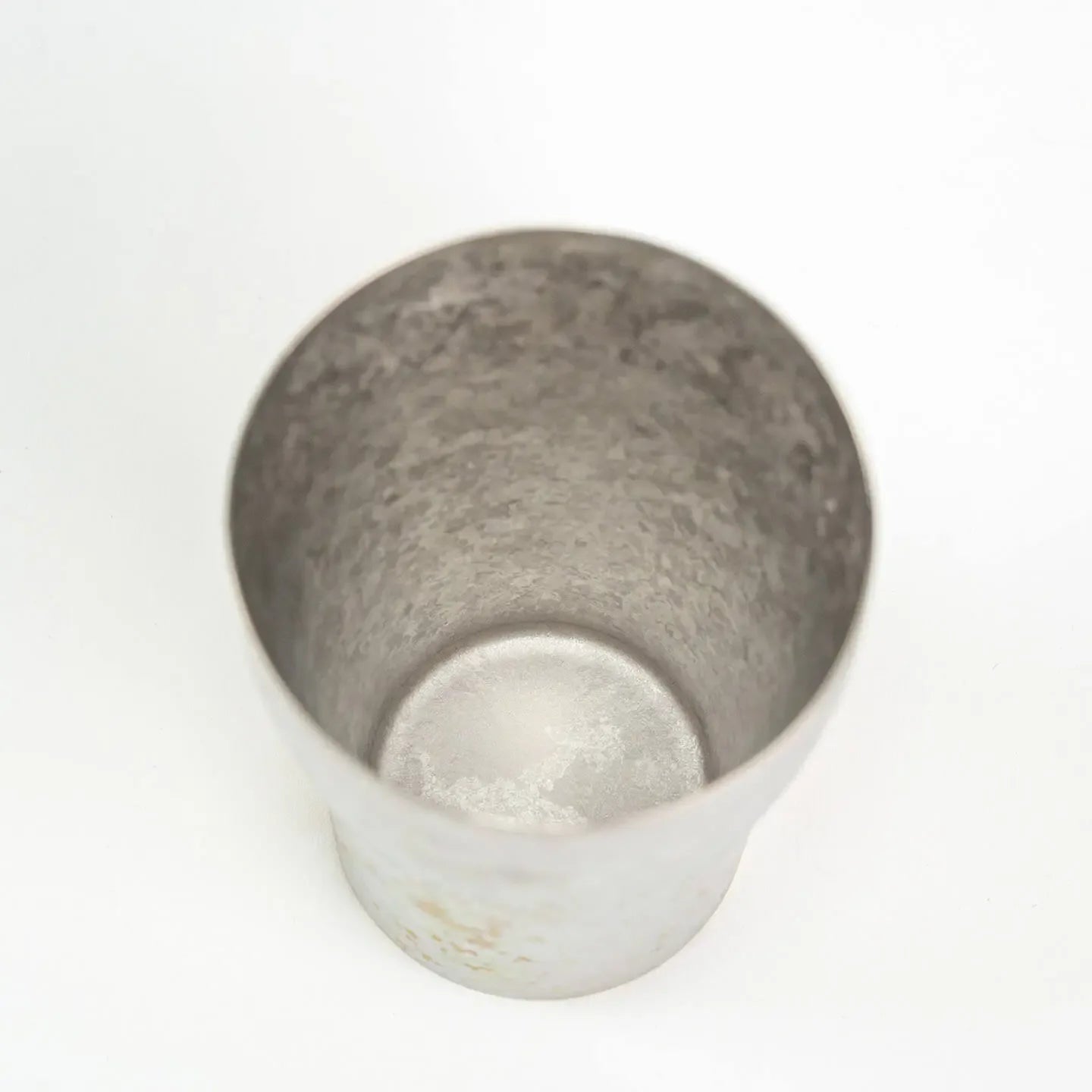 Top-down close-up of the tumbler interior, showcasing the textured silver finish.