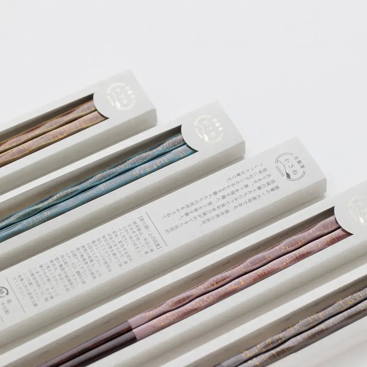 Close-up view of the Wakasa lacquer chopsticks packaging, showcasing intricate details.