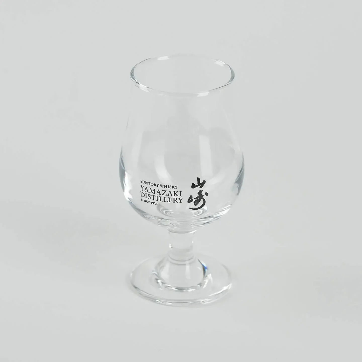 Empty Yamazaki whiskey tasting glass, Japanese tulip-shaped glass