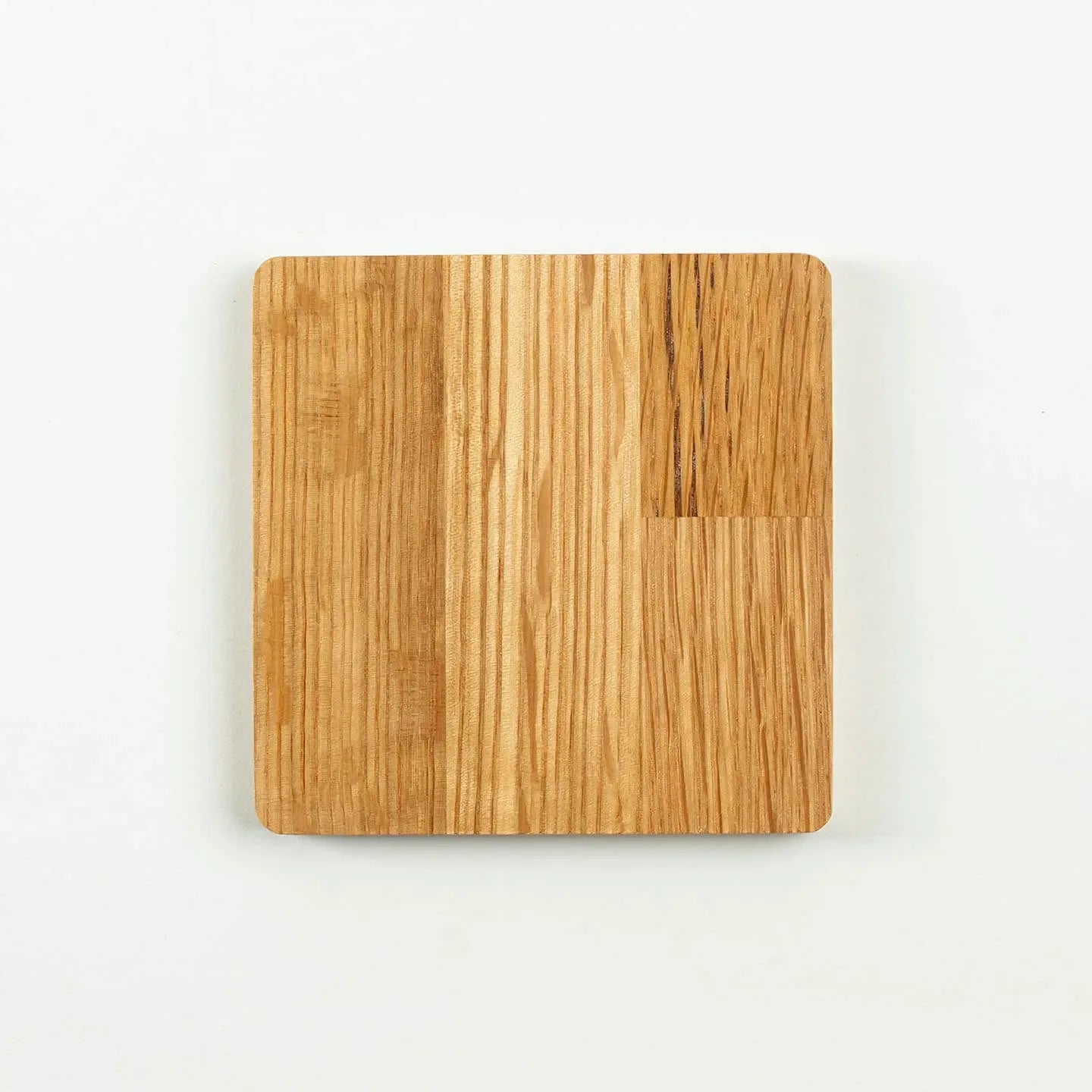 The square Yamazaki cask oak coaster, featuring the classic Japanese single malt whisky label design.